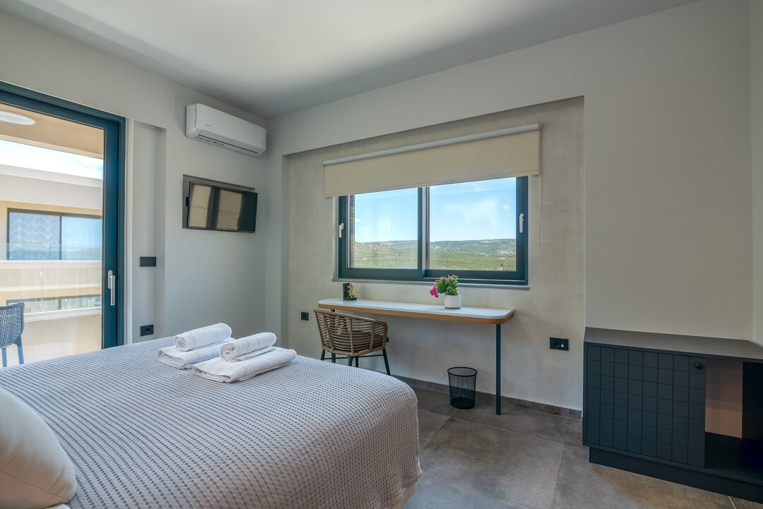 Modern kitchen with stainless appliances and marble backsplash at Nusa Balos near Balos, Crete